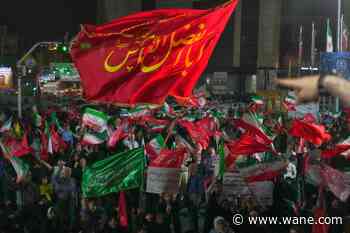 Iran says it is suspending commitments to interim deal with US as they exchange attacks