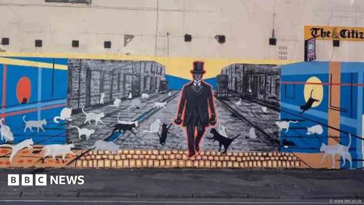 Mural of mayor who fed stray cats is unveiled