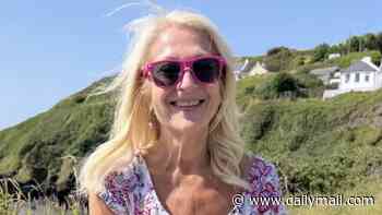 Vanessa Feltz, 64, stuns in a floral summer dress as she enjoys a family beach day after bidding farewell to her daytime show
