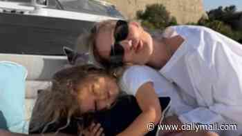 Rosie Huntington-Whiteley shares rare snaps with son Jack, 9, and daughter Isabella, 4, as she enjoys a sunny getaway with fiancé Jason Statham