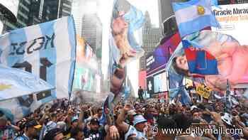 Argentina fans spark wild World Cup scenes in New York as thousands take over Times Square - despite flash floods