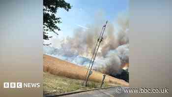 Major crop blaze tackled by dozens of firefighters