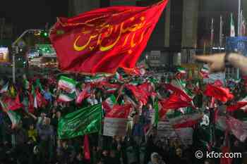 Iran says it is suspending commitments to interim deal with US as they exchange attacks