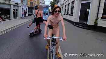 Naked cyclist was 'attacked' by two men on e-scooter during charity ride who nearly pushed him into oncoming bus