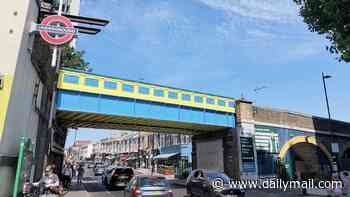 Residents' fury over railway bridge given 'garish' £600,000 paintjob in leafy London suburb