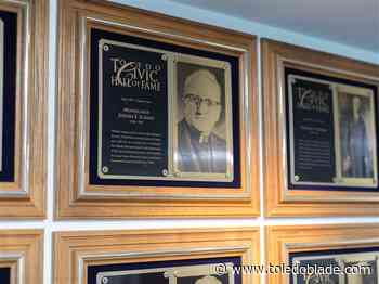 As sign comes down, a look at the rise and fall of Msgr. Schmit’s legacy