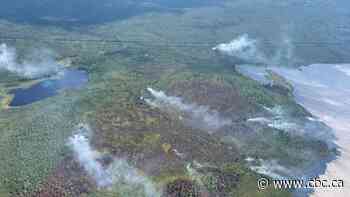 Essential workers evacuate Wrigley, N.W.T., as fire nears