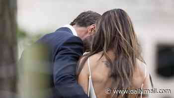 Mel C, 52, looks incredible in a backless bridal gown designed by Victoria Beckham as she shares an intimate moment with new husband Chris Dingwall at 'perfect' wedding