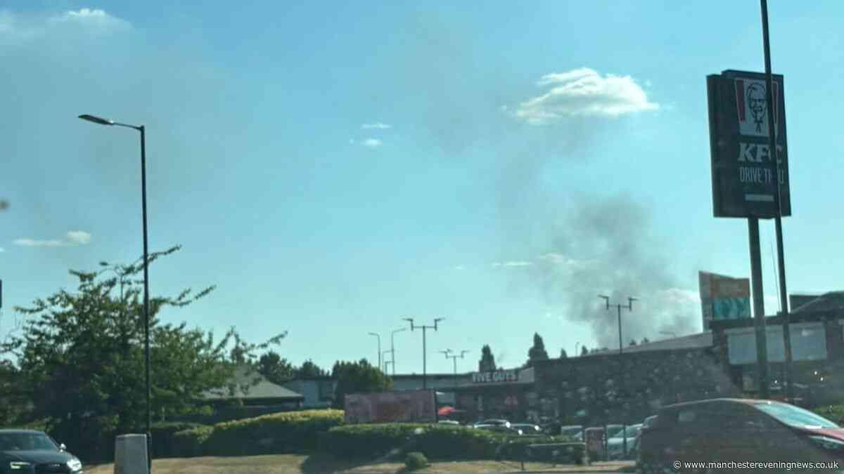 Smoke seen for miles around as firefighters tackle huge blaze at industrial estate