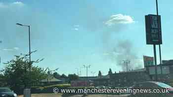Smoke seen for miles around as firefighters tackle huge blaze at industrial estate