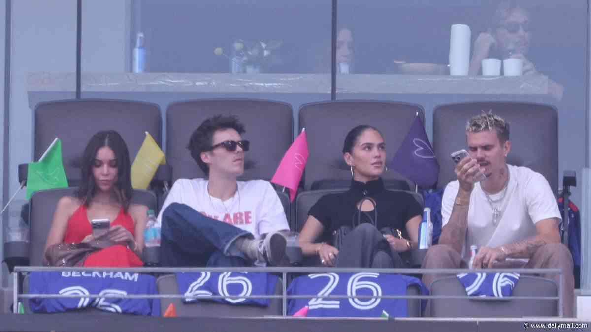 Romeo and Cruz Beckham are joined by their girlfriends Kim Turnbull and Jackie Apostel as they arrive at the World Cup final in New York