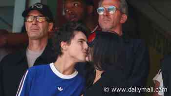 Keep your eyes on the game! Timothee Chalamet can't stop kissing Kylie Jenner as they watch the World Cup final in New Jersey