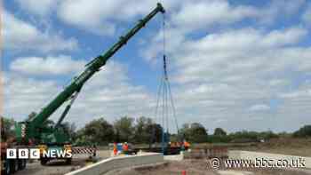 Key bridge installed in historic canal restoration