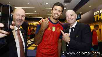 FIFA president Gianni Infantino heads into Spain's locker room to hand out Super Bowl-style gold rings to World Cup champions