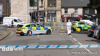 Man charged with murder after woman dies following street altercation