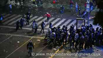 World Cup final chaos as Argentina star throws punches and fans riot after Spain win