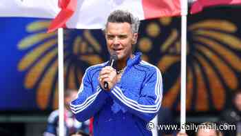 Robbie Williams sparks hilarious comparisons to Paulie from The Sopranos as he wears a sparkly blue tracksuit for World Cup Final show