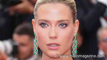 Princess Diana's model niece displays washboard abs in tiny 'ruffle bra' bikini