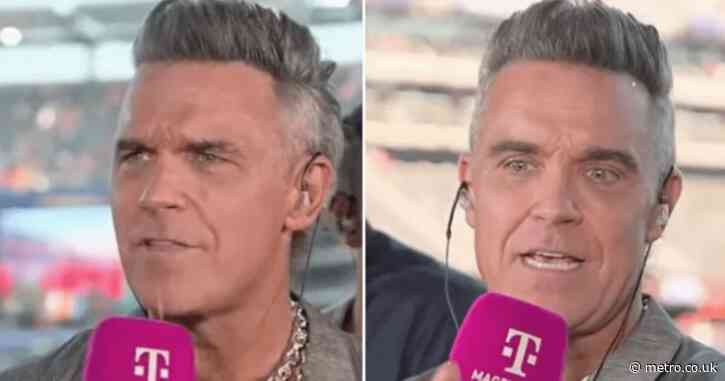 World Cup fans defend Robbie Williams after small object ‘falls out mouth on live TV’