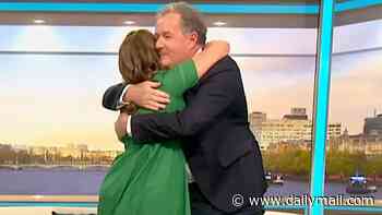 Piers Morgan and 'TV wife' Susanna Reid share a hug as they reunite on Good Morning Britain five years after his dramatic departure as host
