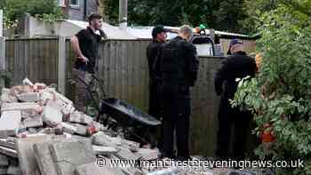 Deadly stash uncovered after police dig up garden of Salford home in major operation
