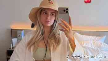 Molly-Mae Hague poses in a bikini just six weeks after giving birth to son Midas as she whisks newborn off on his first holiday via private jet
