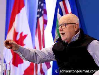 U.S. Ambassador Pete Hoekstra toasts a shot of whiskey to U.S.-Canada partnership