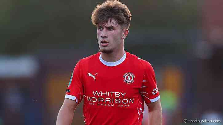 Crewe midfielder Moore agrees new two-year deal