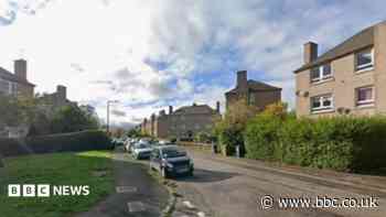 Investigation after man found critically injured in garden