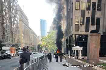 Suspect in custody after starting fire outside New York federal building, FBI says