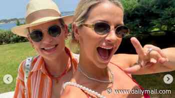 Pregnant Vogue Williams showcases her bump in red bikini as she enjoys girls trip in Ibiza with her best friend Amber after Spanish family holiday