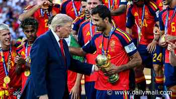 Spain World Cup hero Ferran Torres gives nod to Donald Trump during homecoming parade after president's trophy-lift saga