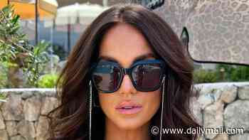 Bikini-clad Vicky Pattison takes her mind off fertility struggles by jetting to Ibiza with husband Ercan Ramadan after tearfully admitting she feels 'lost' as she doesn't have a baby