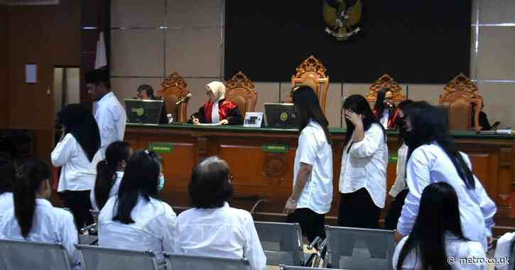 Nineteen members of child trafficking ring jailed over illegal adoptions