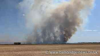 Huge fire engulfs field near Cambridgeshire town