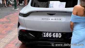 One of Australia's richest men is hauled before court - billionaire allegedly refused to pay a $198 parking ticket for leaving his $500,000 Aston Martin in a loading zone