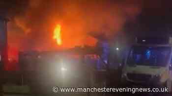 Huge flames engulf Manchester home as blaze breaks out