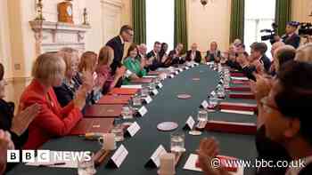Applause as Burnham arrives for first cabinet meeting as PM