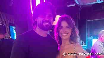 Chloe Lewis and Dan Edgar are pictured together for the FIRST TIME as they cosy up on romantic night out... one year after finding love