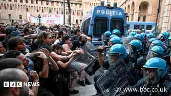 Dozens hurt in Bologna protests after man dies while being restrained by police