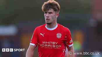 Crewe midfielder Moore agrees new two-year deal