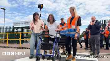 Woman's first steps since losing hands and feet