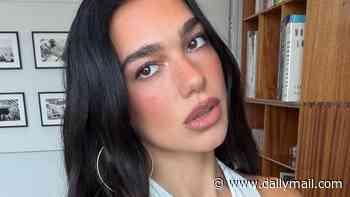 Newly-married Dua Lipa sizzles in a backless top as she shares photos with husband Callum Turner at the World Cup
