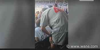 Watch: Man slaps fan not standing for national anthem at Cubs game