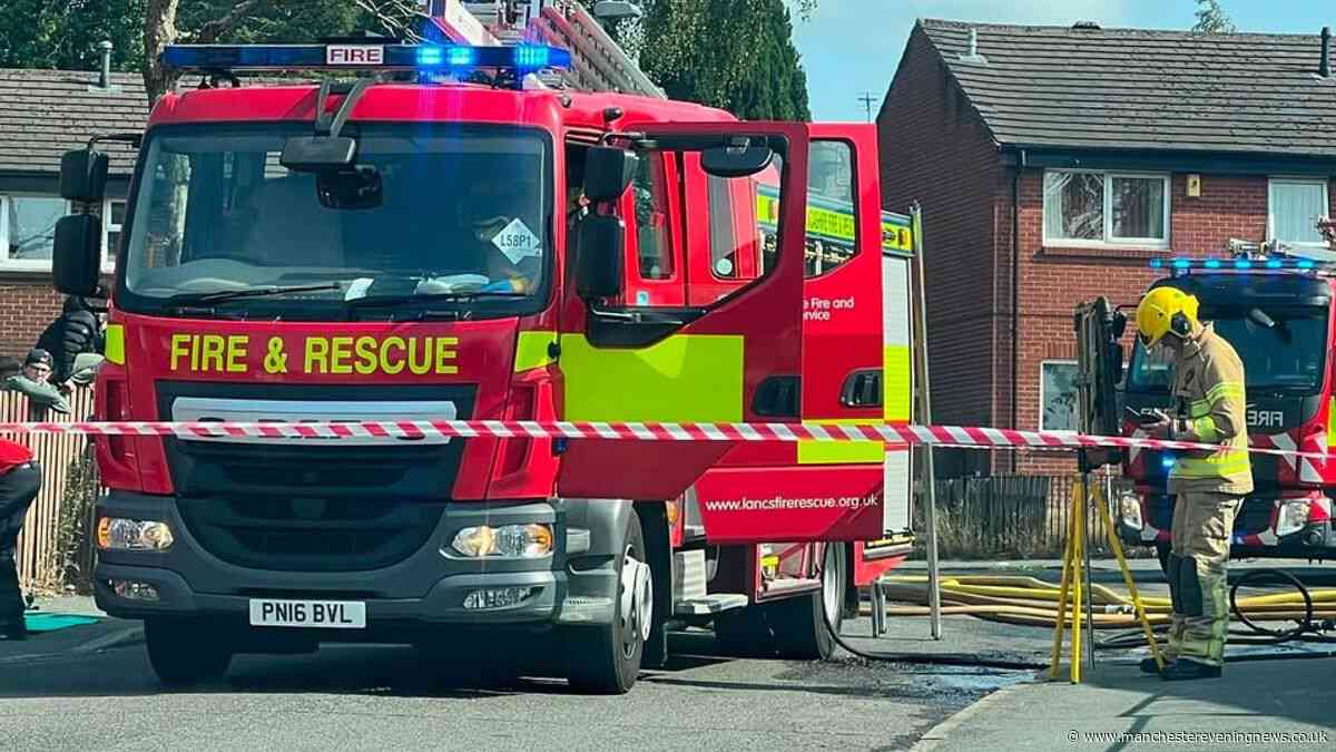 Salford shed fire sparks major alert amid fear blaze could spread to homes