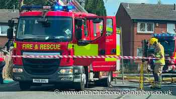 Salford shed fire sparks major alert amid fear blaze could spread to homes