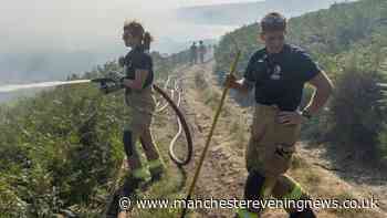 Dovestone moorland blaze: firefighters set to remain until the weekend