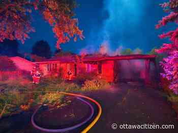 Two homes involved in fire near Mooney's Bay