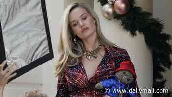 Georgia May thinks Christmas has come early! Mick Jagger's tartan-clad daughter films festive advert in July with Vinnie Jones