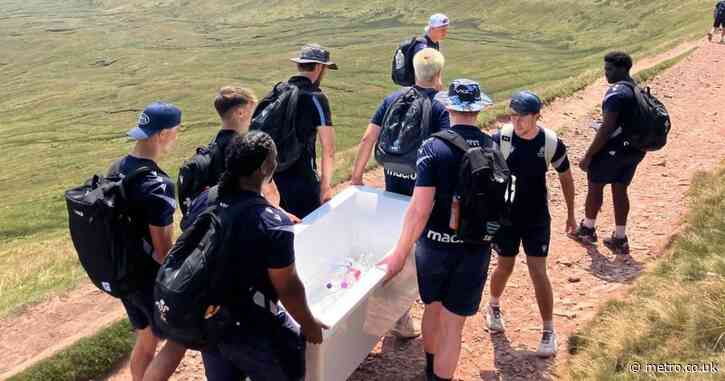 Hero rugby team removes massive bit of junk ‘influencer’ carried to top of mountain